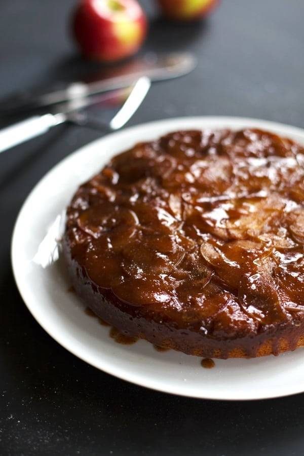 Salted Caramel Apple Upside Down Cake on a white plate.