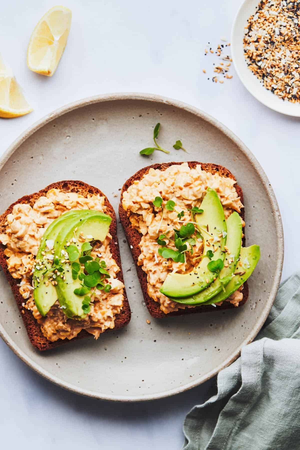 Chickpea salad on toast with avocado.