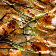 A picture of Apricot Chicken with Charred Scallions