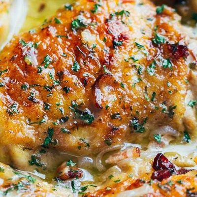 Skillet Chicken with Bacon and White Wine Sauce in a pan.