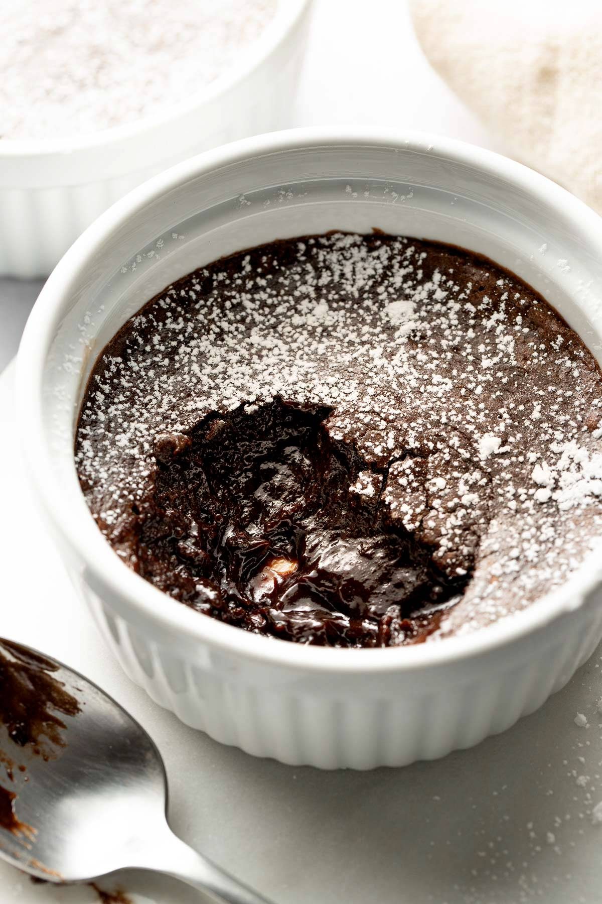 Brownie pudding in a ramekin.