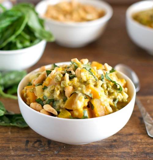 These Thai basil coconut lentils have the most amazing flavor! Peanuts, basil, squash, lentils, and a fresh Thai seasoning paste called tom kha. | pinchofyum.com